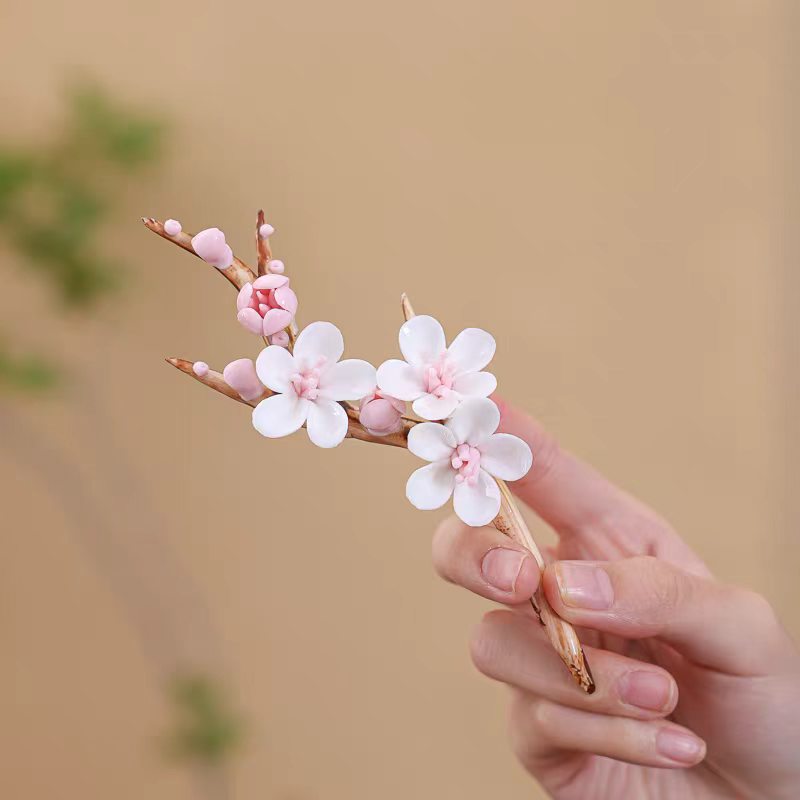 Jingdezhen Ceramic Plum Blossom Relief Vase with Plum Branch Arrangement — Handcrafted Porcelain Tea Desk Decor