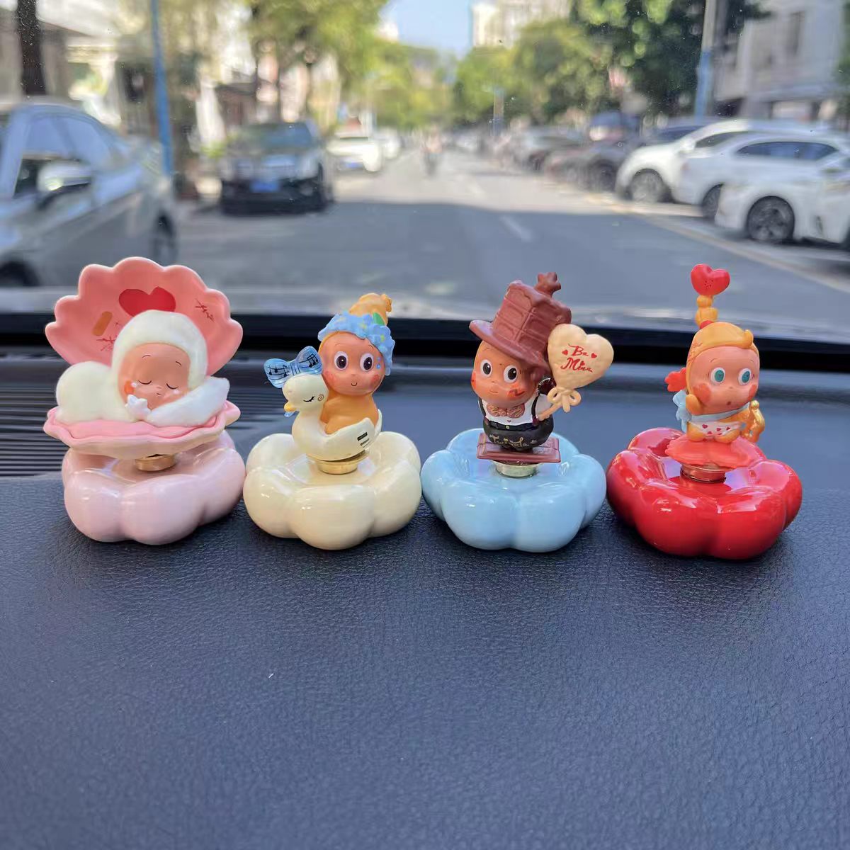 Kawaii Big-Eye Baby Figurine on Rotating Pumpkin Cloud Base — Car Dashboard Blind Box Series, 9+ Styles