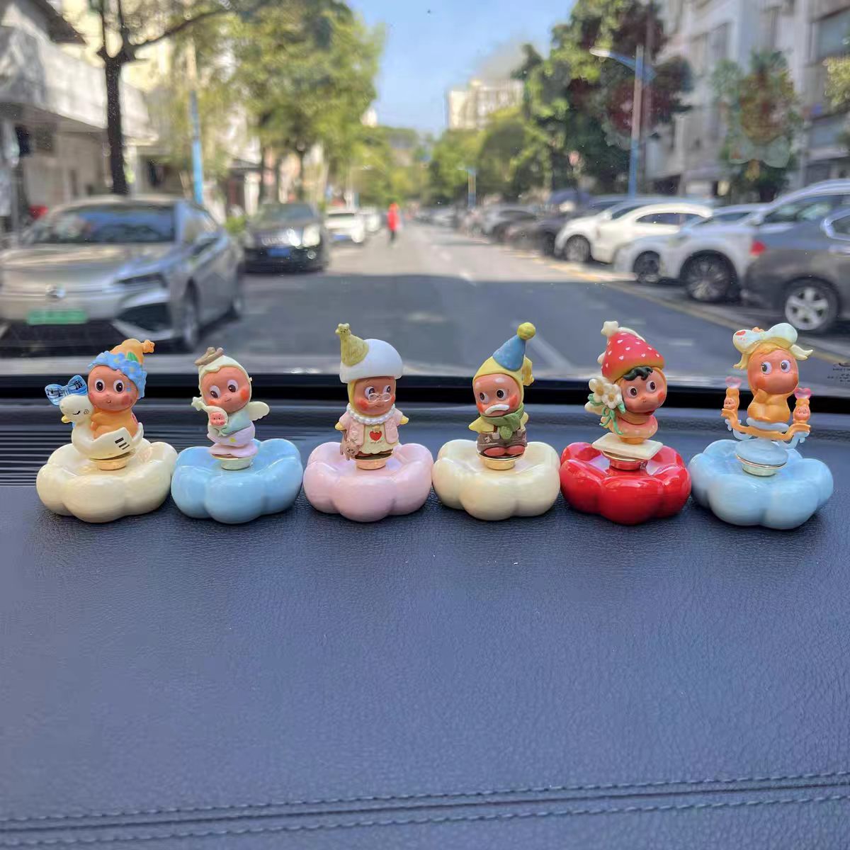 Kawaii Big-Eye Baby Figurine on Rotating Pumpkin Cloud Base — Car Dashboard Blind Box Series, 9+ Styles