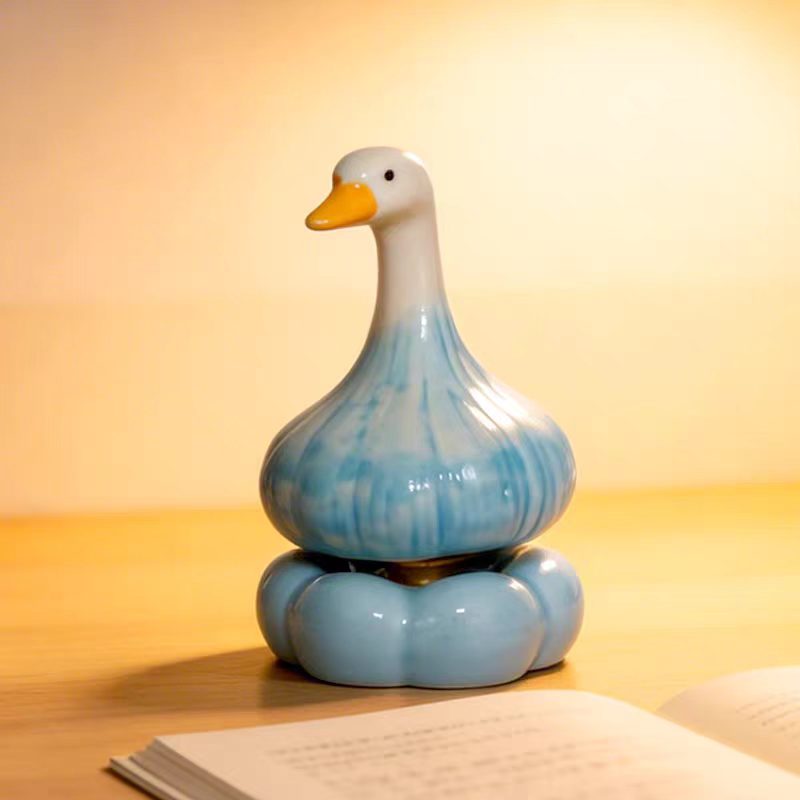 Ceramic Garlic Duck Spinning Figurine — Pastel Gradient Glaze Pumpkin Base Desk Decor