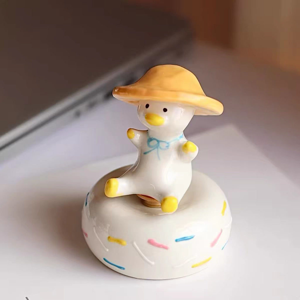 Kawaii Chubby Duck Figurine on Rotating Sprinkle Donut Base — Straw Hat & Classic Duck, 2 Styles