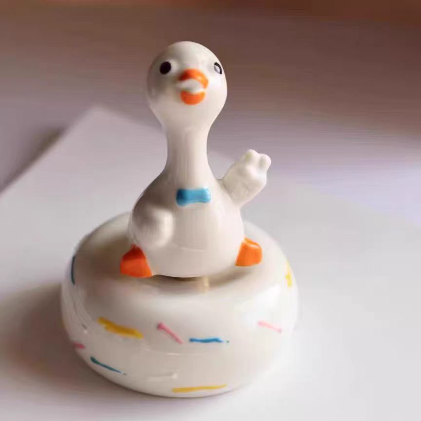 Kawaii Chubby Duck Figurine on Rotating Sprinkle Donut Base — Straw Hat & Classic Duck, 2 Styles