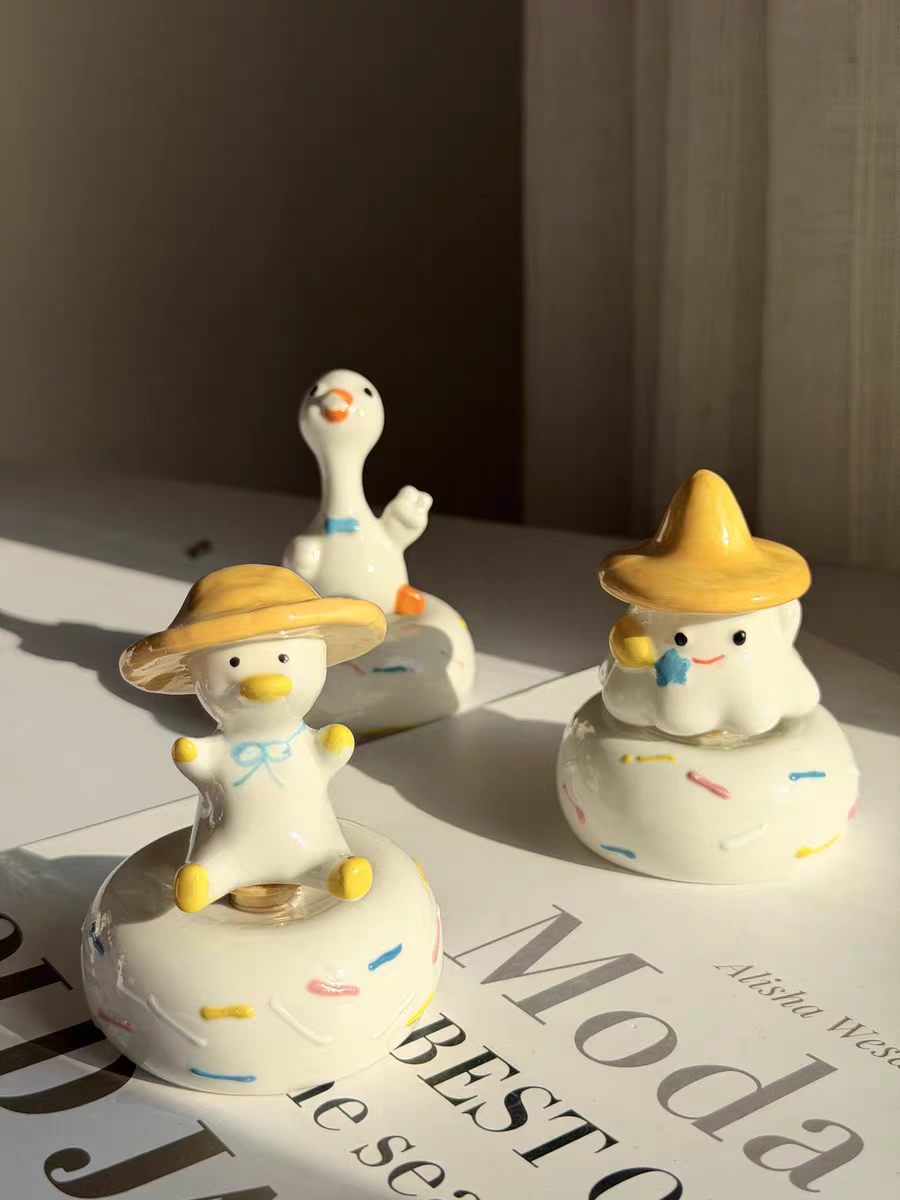 Kawaii Chubby Duck Figurine on Rotating Sprinkle Donut Base — Straw Hat & Classic Duck, 2 Styles