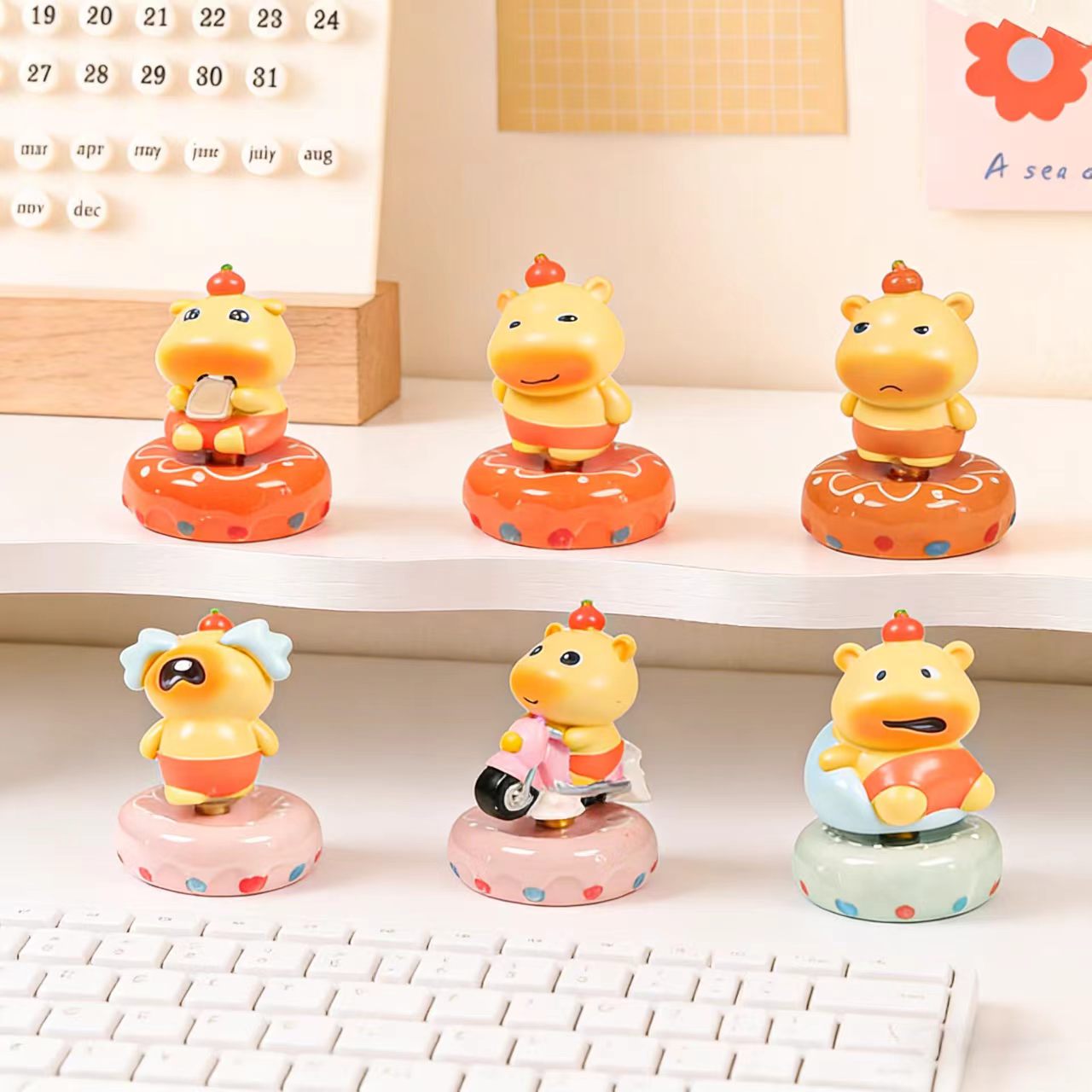 Kawaii Chubby Hippo Figurine on Rotating Donut Base — Angry, Crying, Swimming & Scooter, 4 Styles