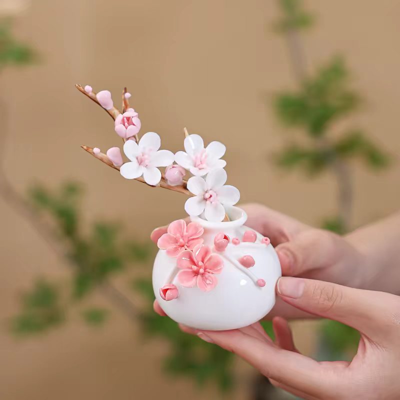 Jingdezhen Ceramic Plum Blossom Relief Vase with Plum Branch Arrangement — Handcrafted Porcelain Tea Desk Decor